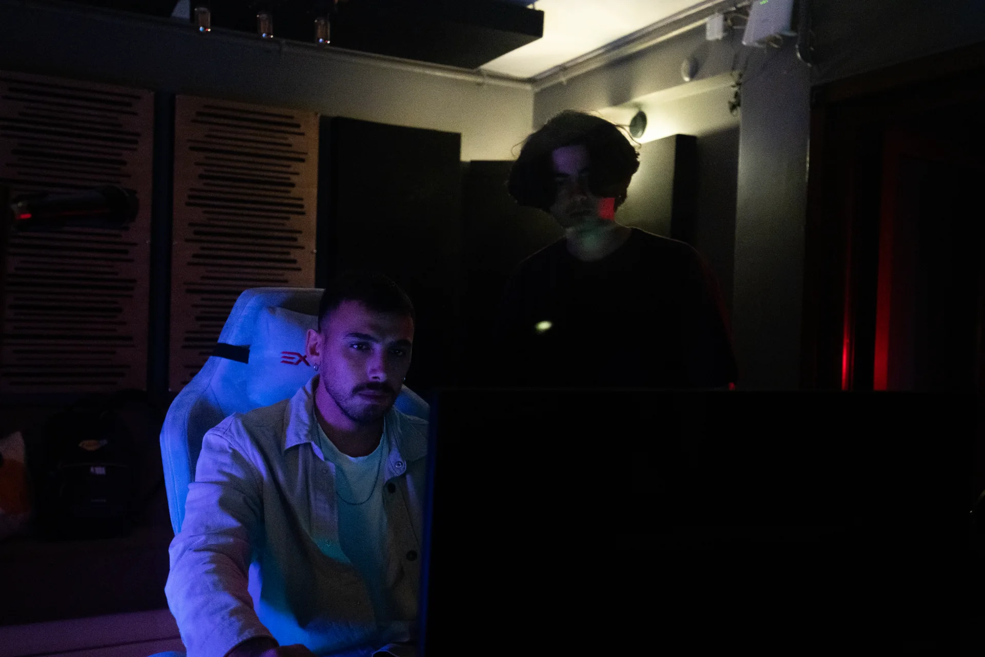 Sound engineers collaborating during a Cadence Track studio session
